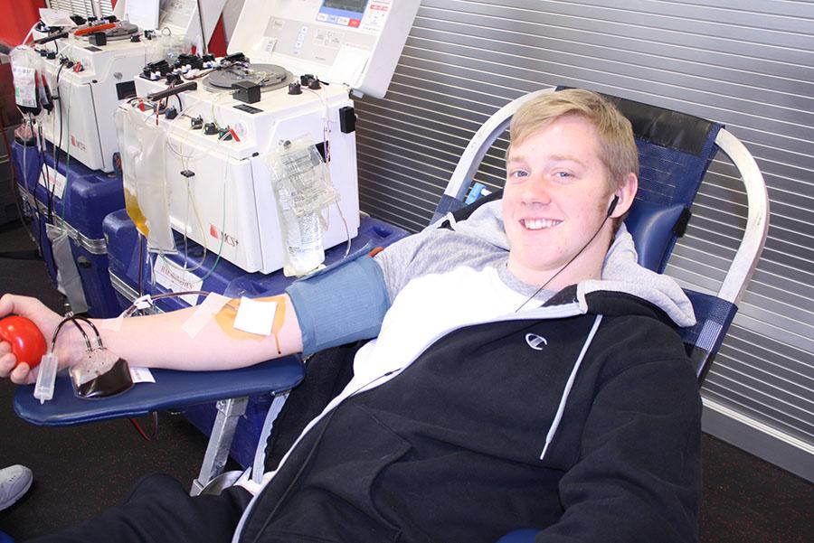 Pete+Sommers+gives+blood+during+the+National+Honor+Society+Blood+Drive.